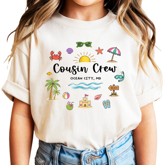 Family matching Cousin Crew shirt displaying fun Ocean City Maryland beach vacation themed artwork