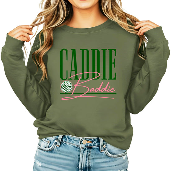 Army green Caddie Baddie crewneck sweatshirt with white text graphic for women