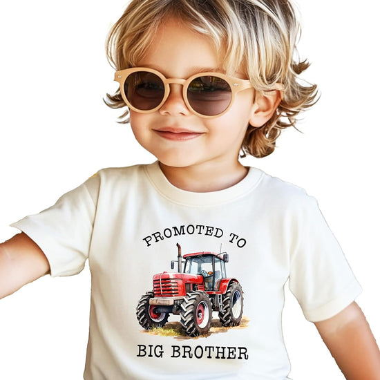 Back view of natural colored boys tee showing shirt construction and fit
