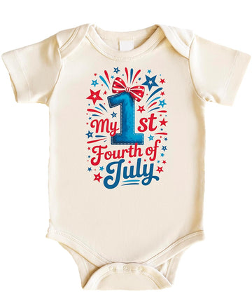 Close-up view of patriotic baby bodysuit showing detailed stars, stripes and hand-lettered script graphics