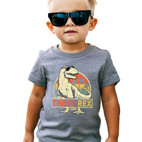 Back view of Three Rex 3rd birthday dinosaur shirt showing plain black back