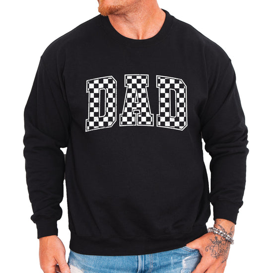 Close-up of Dad checkered graphic design showing retro black and white pattern detail
