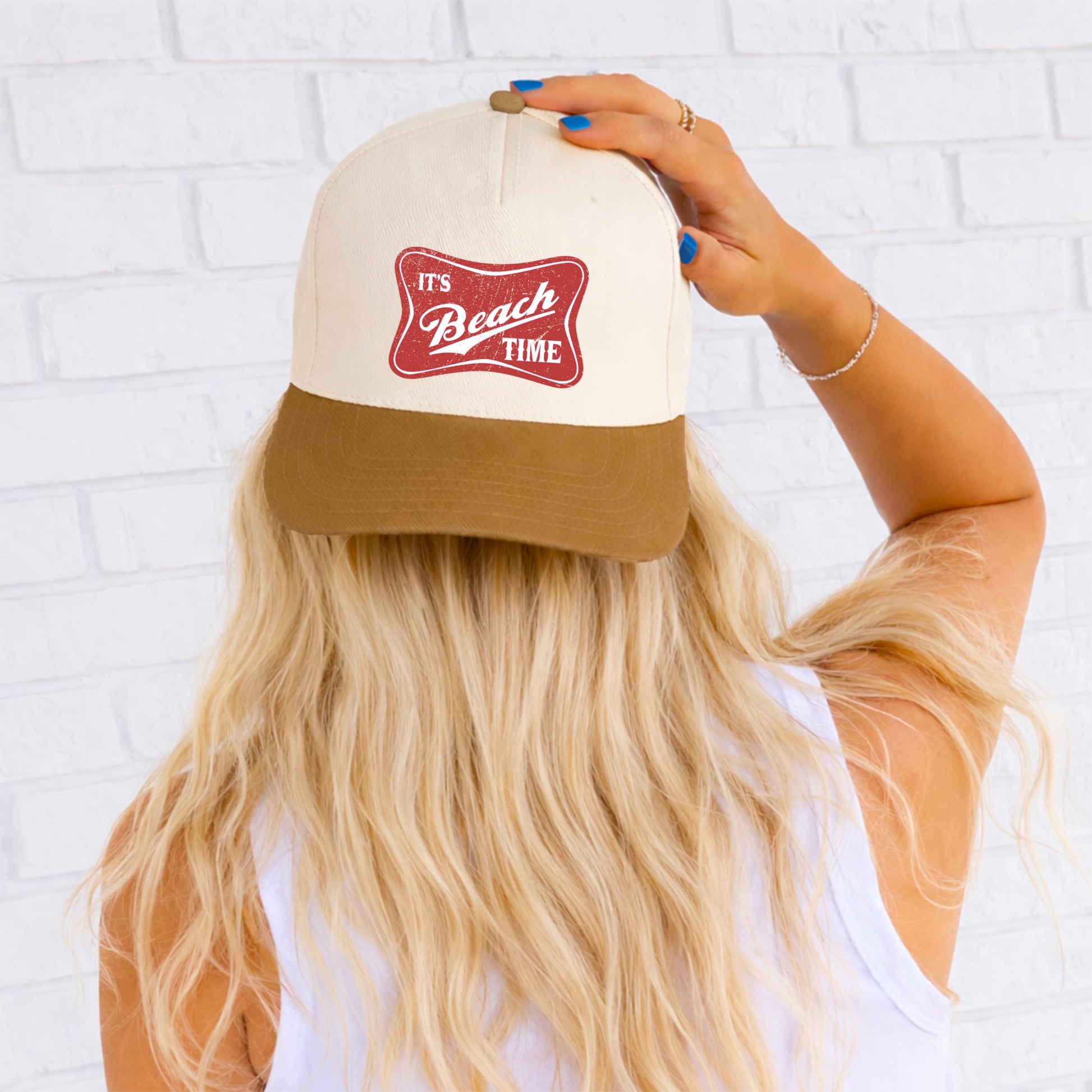 Close-up detail of Beach Time graphic print on tan cotton twill snapback hat surface