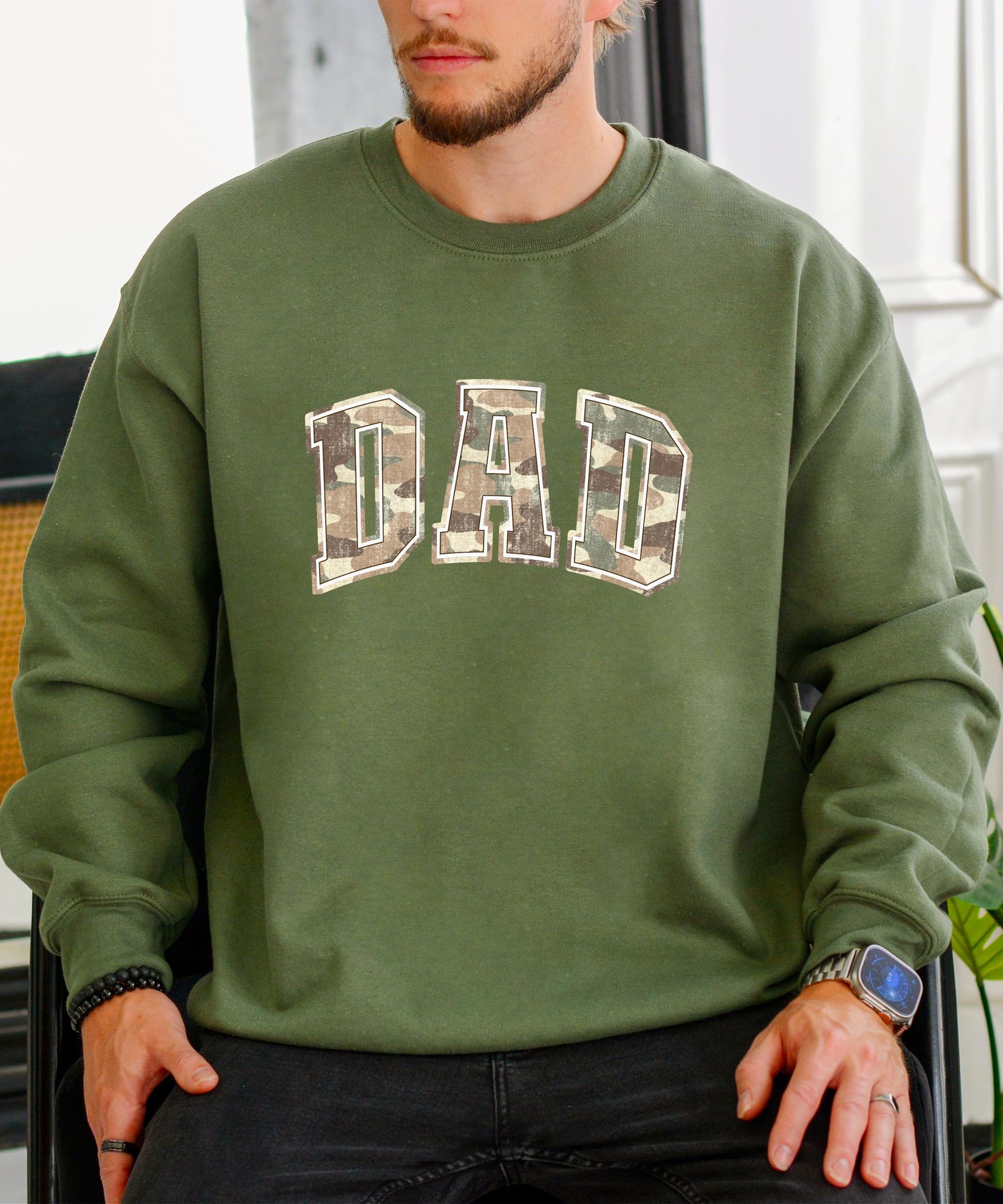Flat lay of camo dad hunting sweatshirt showing overall design