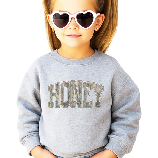Flat lay of Honey Camo army green camouflage sweatshirt