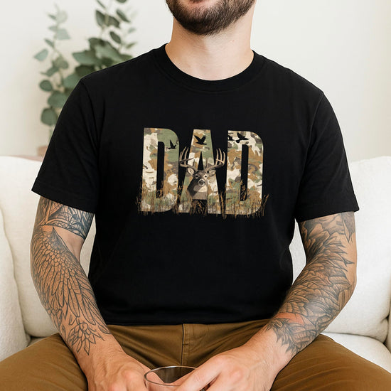 Side angle view of men's hunting graphic tee with camo text and deer artwork