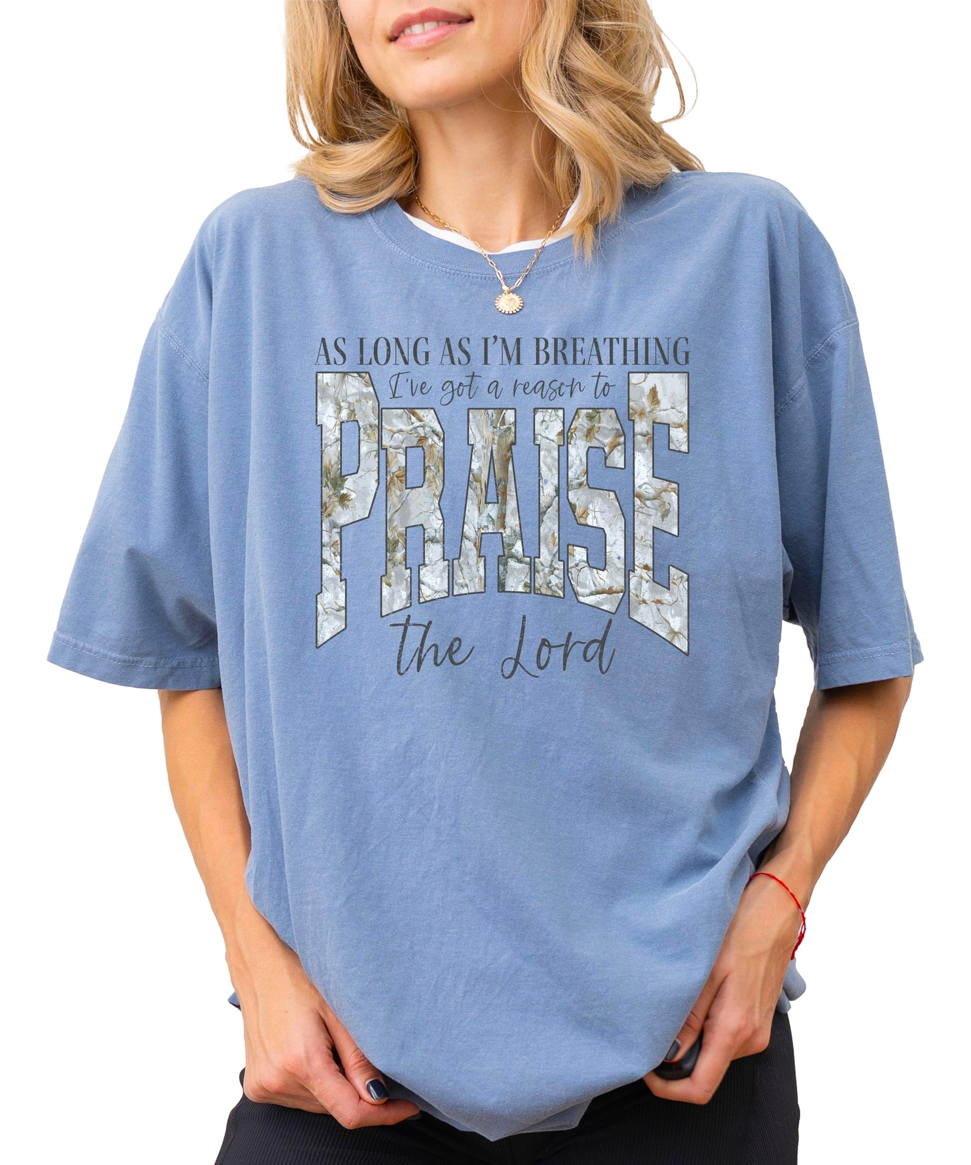 Women's blue jean colored Christian Easter t-shirt with As Long As I'm Breathing I've Got a Reason to Praise text