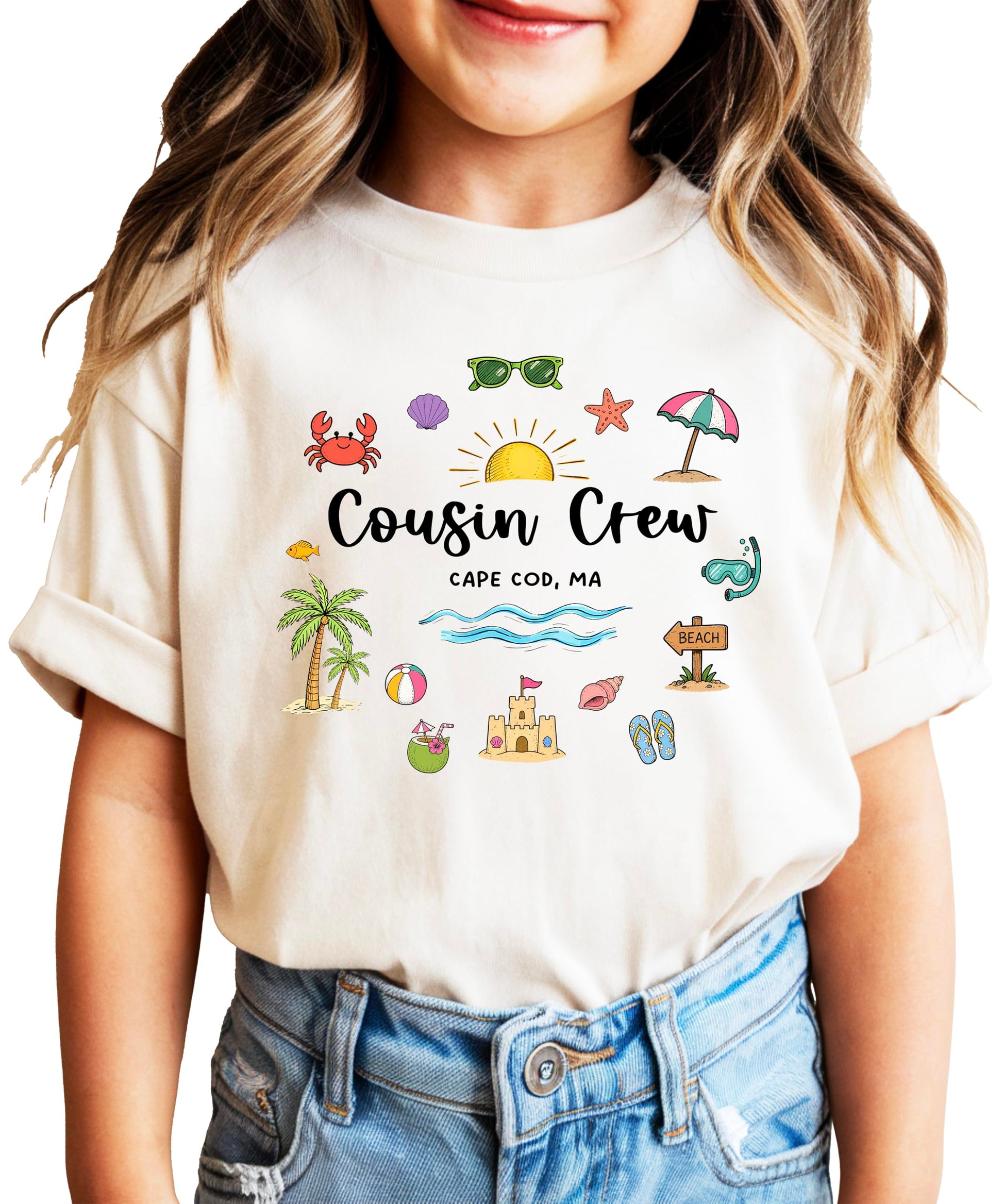 Family wearing matching Cousin Crew Cape Cod vacation shirts on beach boardwalk with ocean background