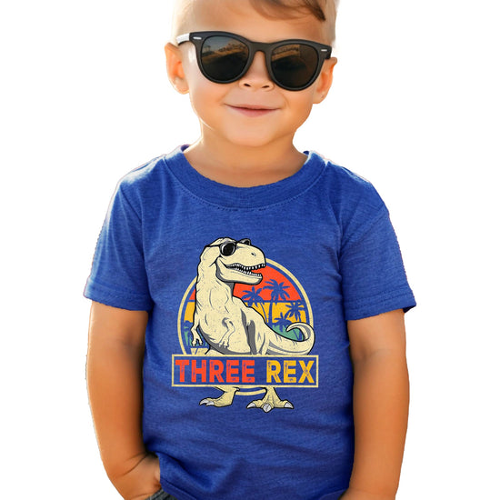 Three Rex dinosaur birthday shirt laid flat showing full design and fit