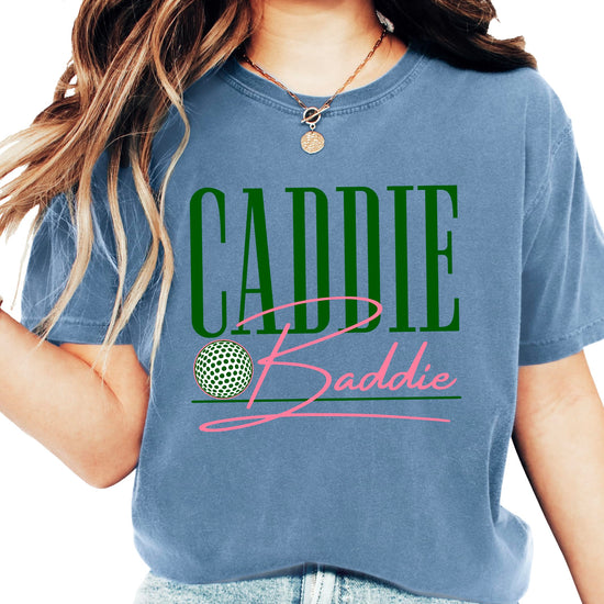 Caddie Baddie golf shirt for women in blue displayed on model