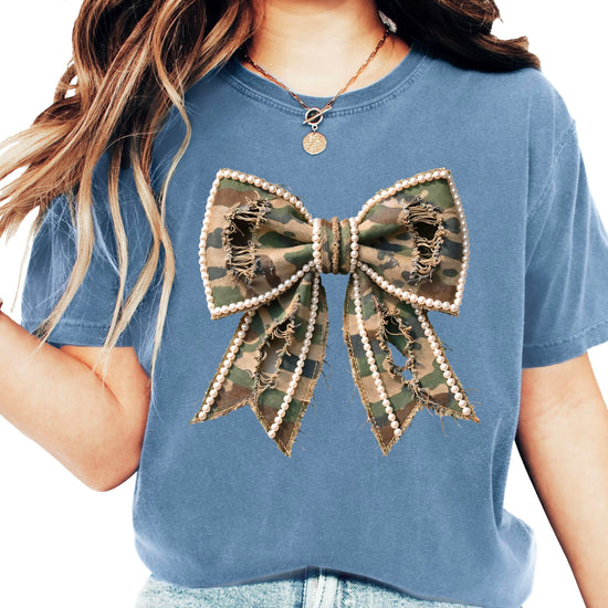 Camo and pearls bow graphic shirt displayed flat showing complete design