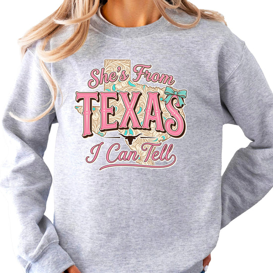 Back view of Texas cowgirl sweatshirt showing plain army green fabric and relaxed fit