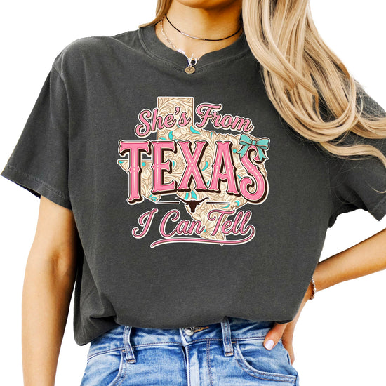 Close-up of She's from Texas graphic print design on women's t-shirt