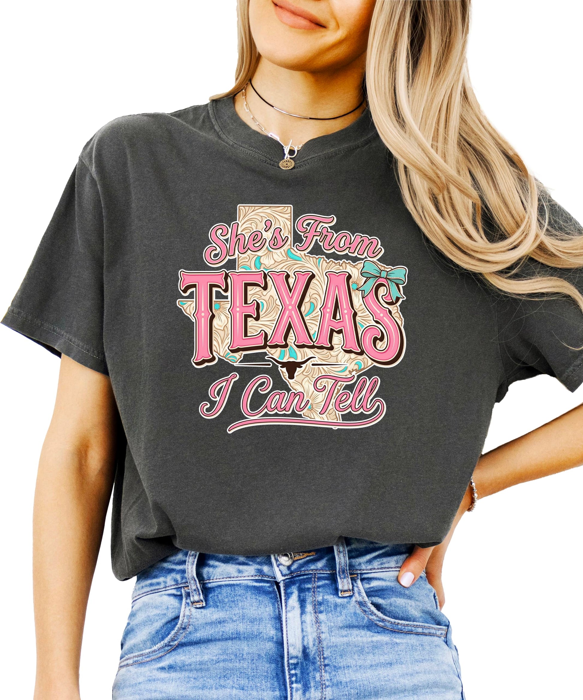 Close-up of She's from Texas graphic print design on women's t-shirt