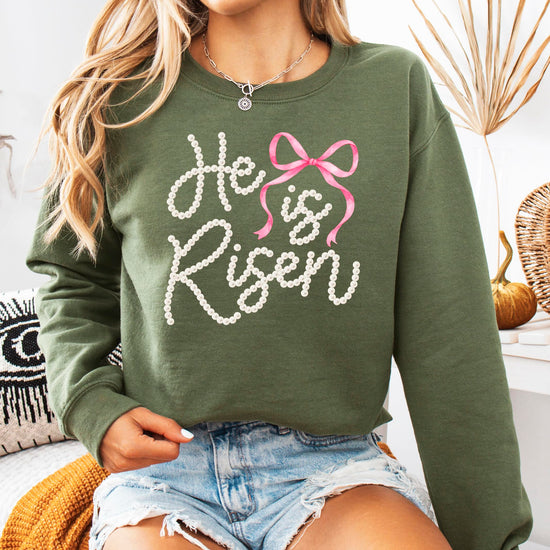 Side angle of women's Christian faith sweatshirt with pearl bow Easter design