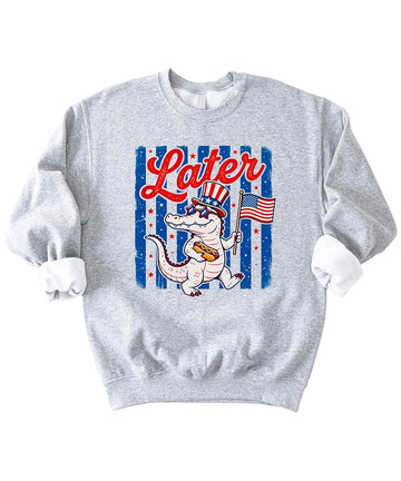 Later Gator patriotic sweatshirt with alligator wearing American flag top hat and sunglasses holding hot dog