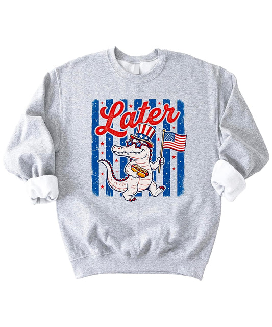 Later Gator patriotic sweatshirt with alligator wearing American flag top hat and sunglasses holding hot dog
