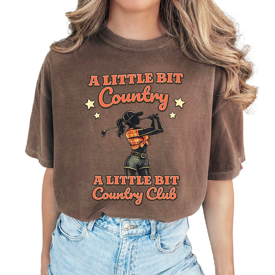 Close-up of country club golf shirt text design on blue women's t-shirt