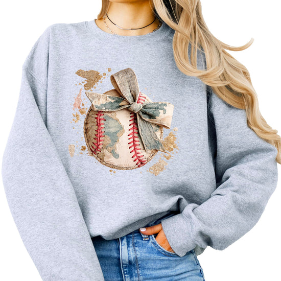 Side angle of camo bow baseball sweatshirt showing relaxed fit and sleeve detail