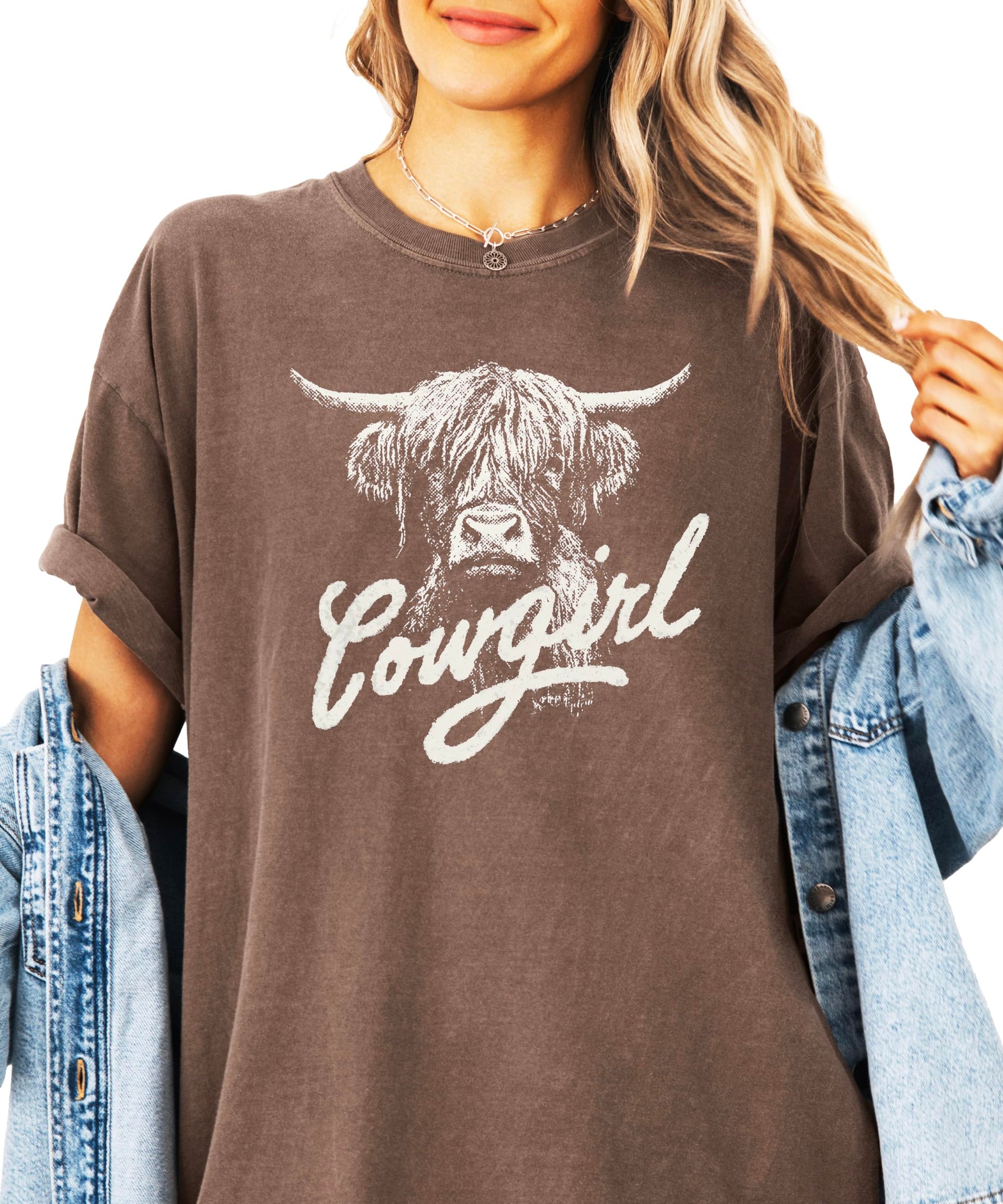 Product flat lay of blue highland cow western graphic tee for women