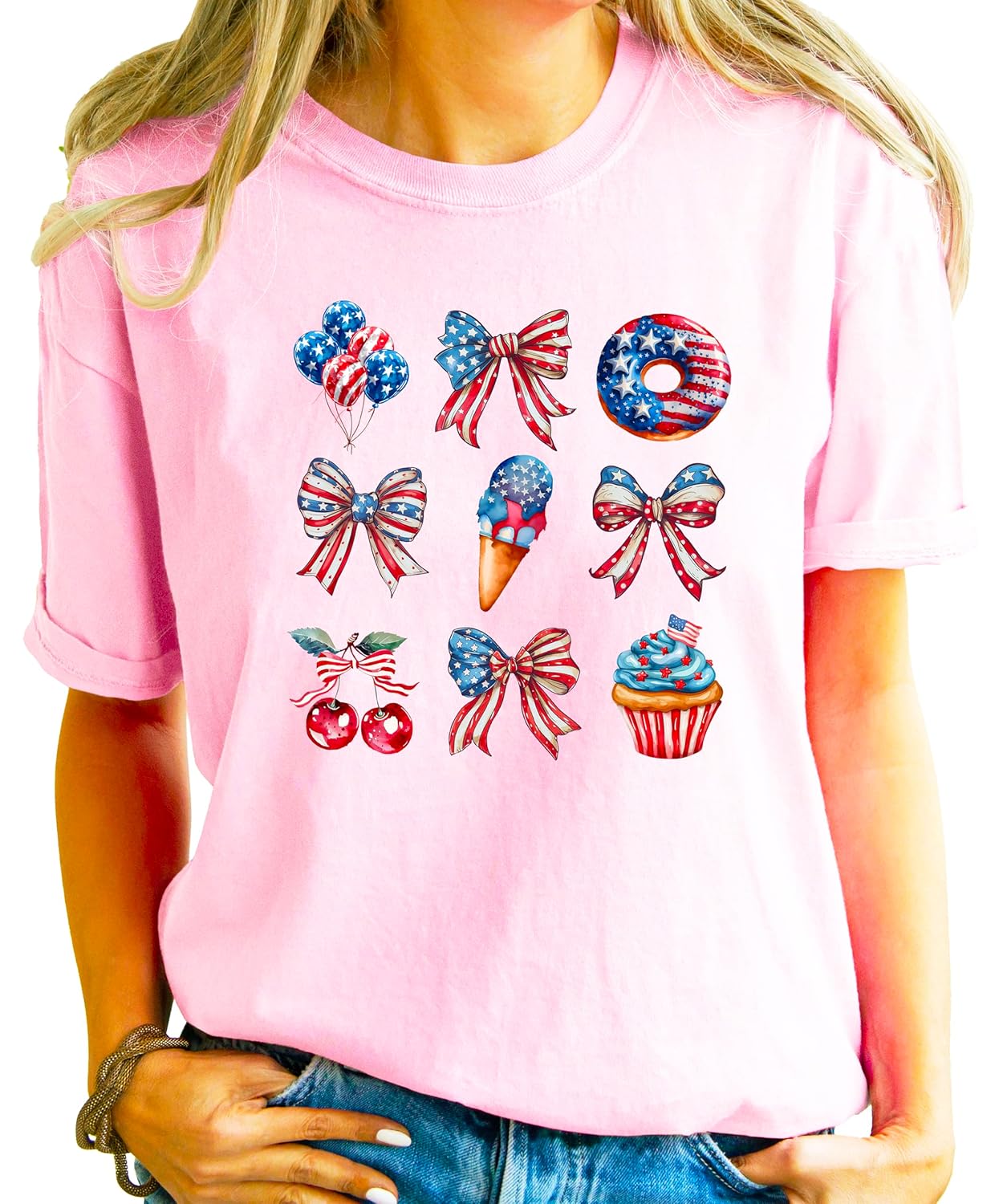 Pink 4th of July shirt styled with denim shorts showing comfortable fit and patriotic bow graphics