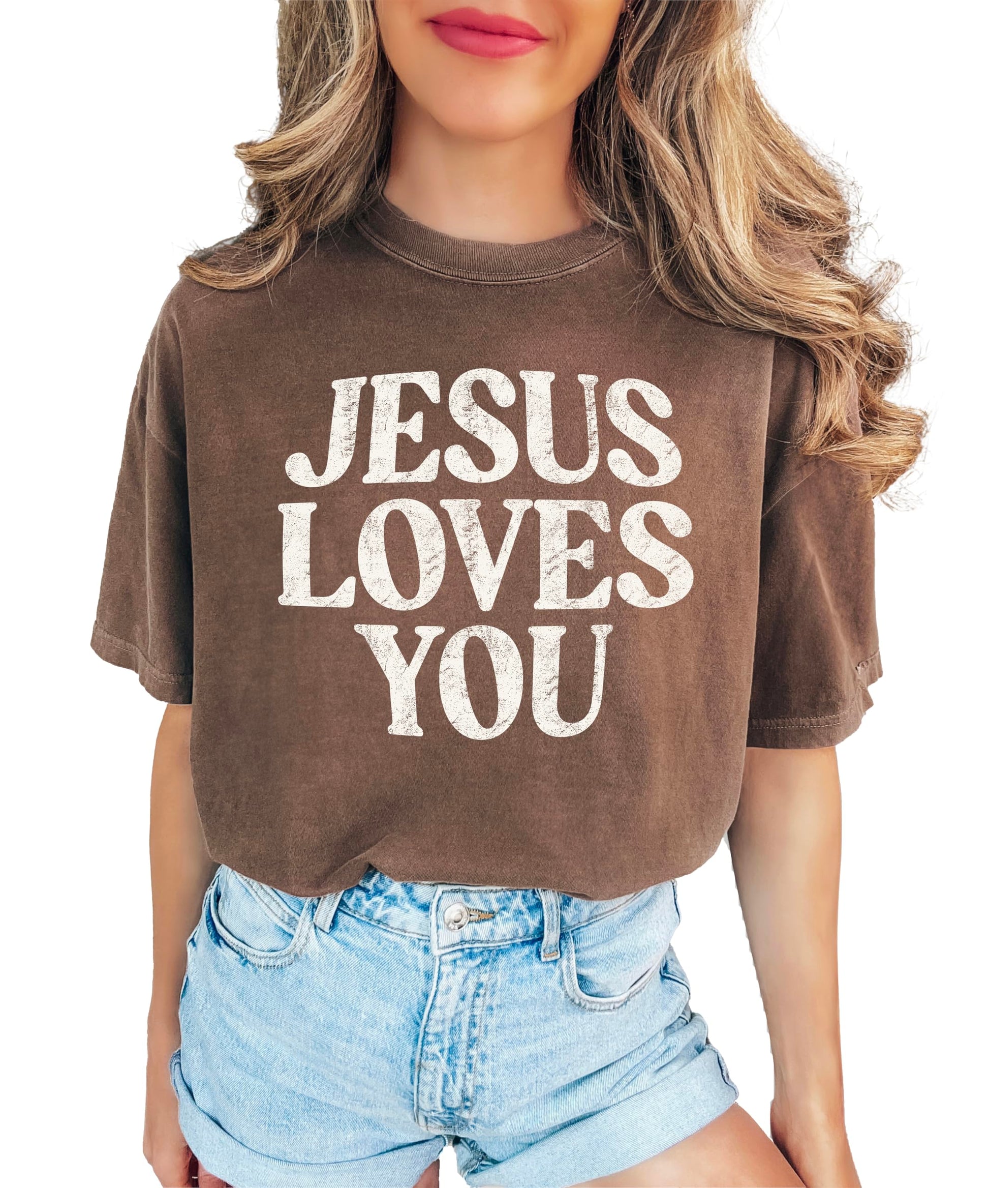 Woman wearing Jesus Loves You Christian faith shirt in casual blue jean shade