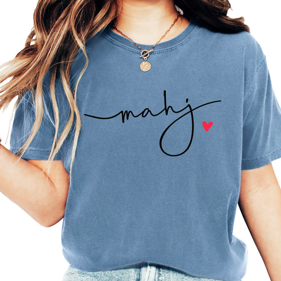 White women's t-shirt with black cursive "mahj" script and small red heart design