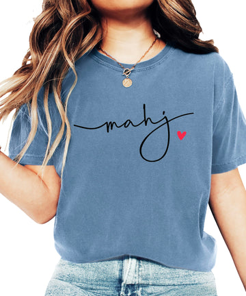 White women's t-shirt with black cursive "mahj" script and small red heart design
