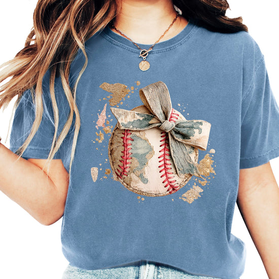 Women's light blue baseball t-shirt with vintage baseball graphic and camo bow design