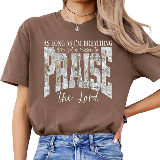 Side angle view of women's blue Christian Easter t-shirt displaying faith-based inspirational text