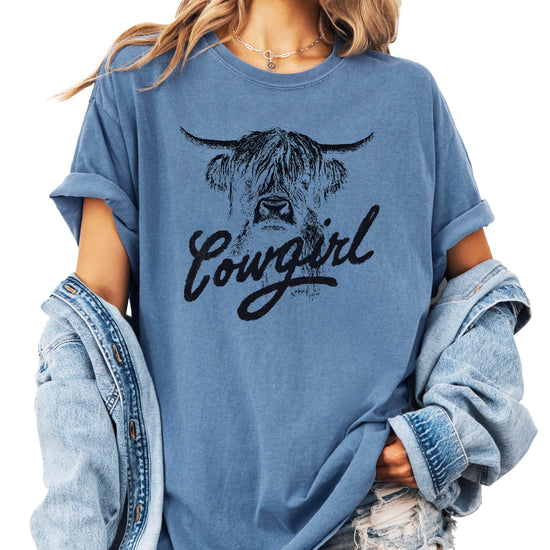 Highland cow cowgirl shirt styled with denim showing complete western look