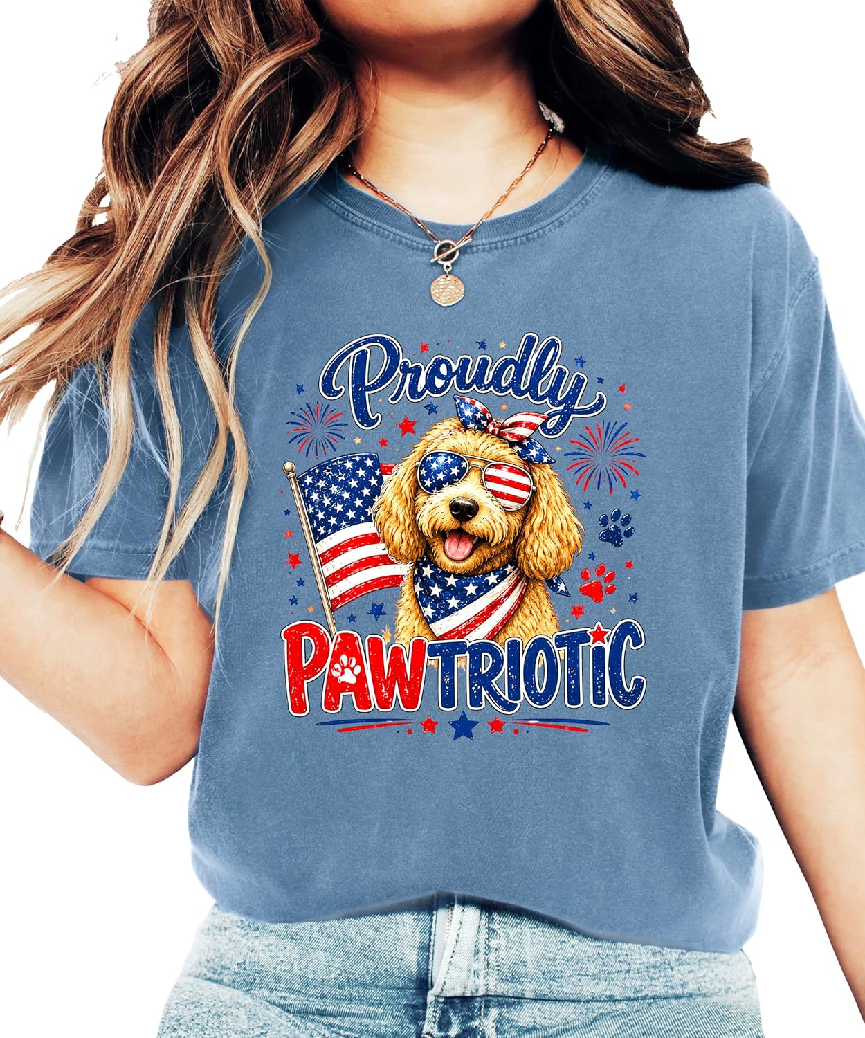 Flat lay of Proudly Pawtriotic doodle dog 4th of July women's graphic tee showing full design