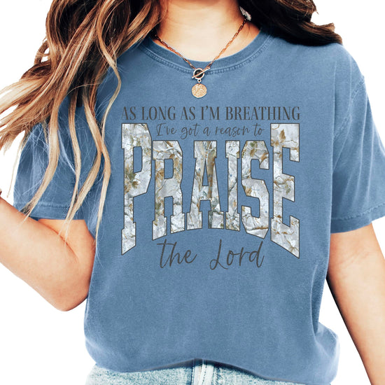 Women's Christian Easter shirt laid flat showing full shirt length and As Long As I'm Breathing design