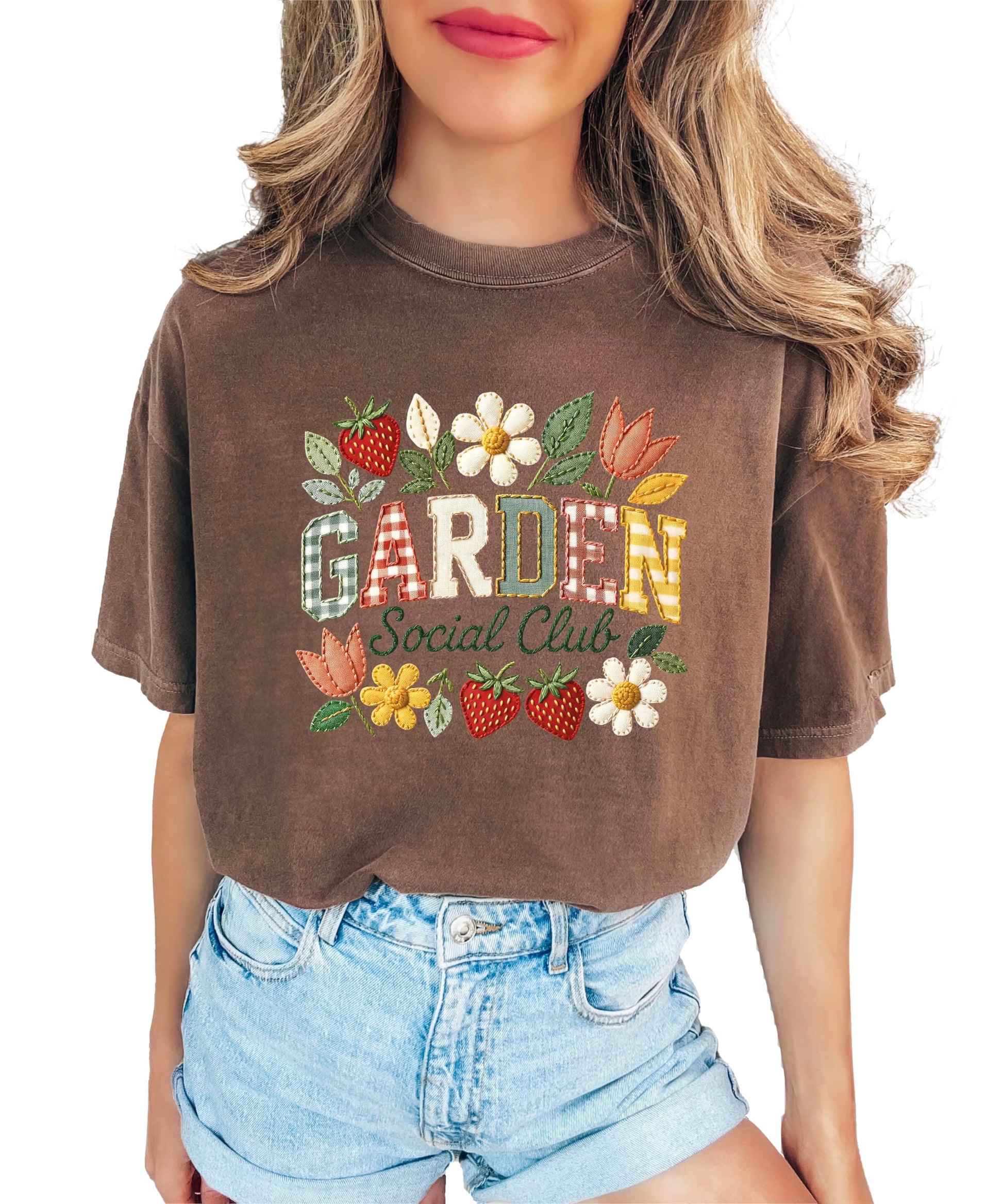 Close-up of Garden Social Club floral graphic print on blue denim shirt showing detailed artwork