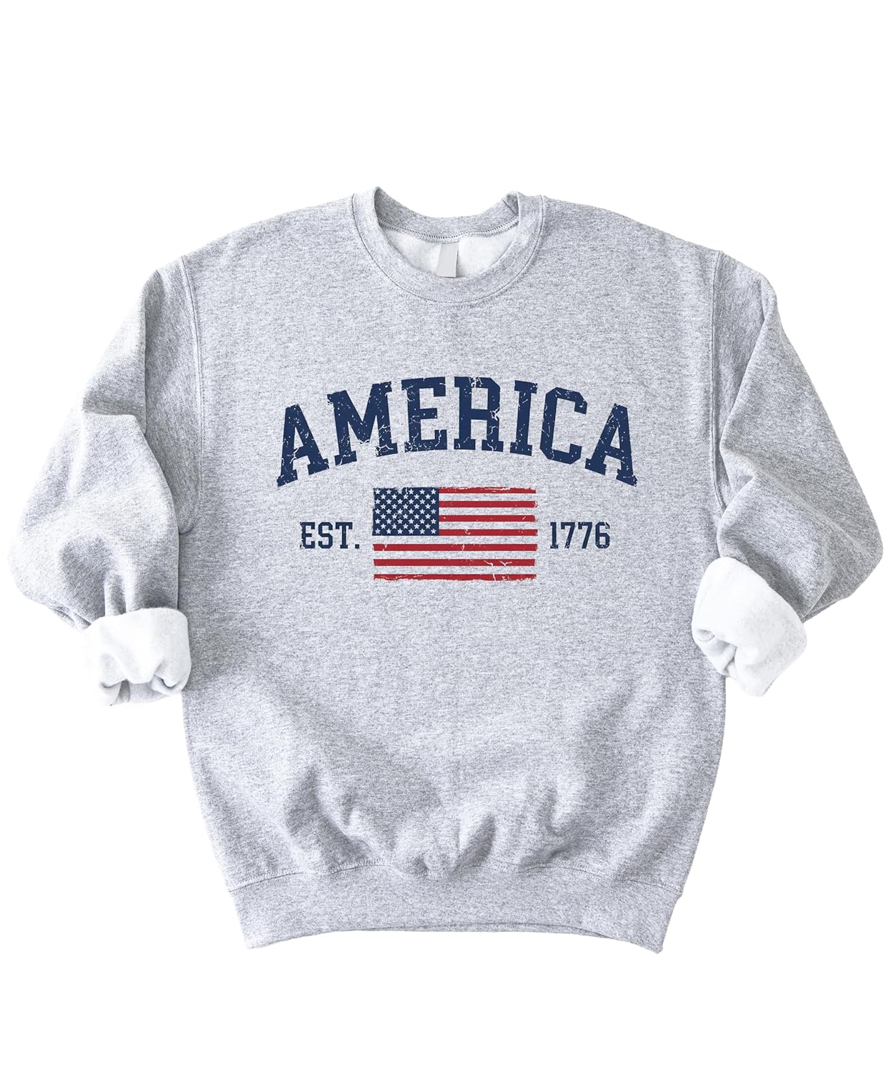 Close-up of America Est 1776 sweatshirt showing weathered American flag design with stars and stripes
