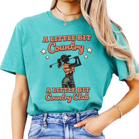 Side view of women's country club themed graphic t-shirt in blue