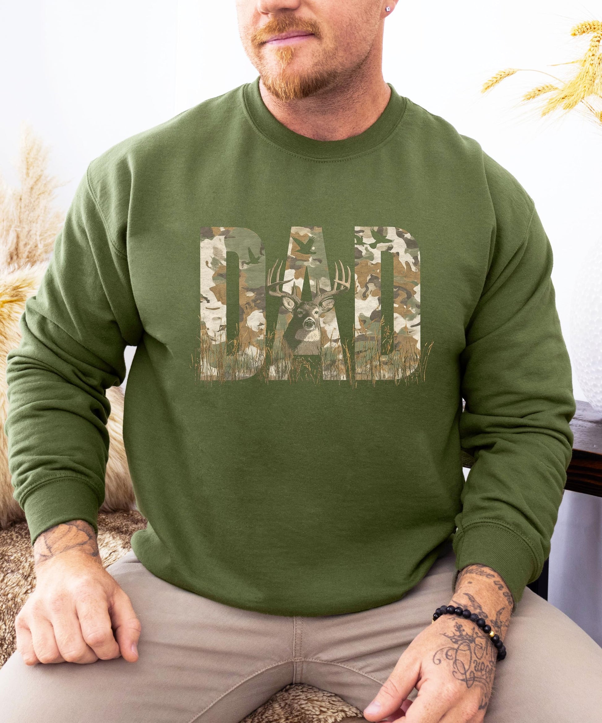 Back view of army green hunting sweatshirt showing plain back design
