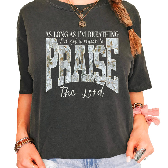 Full front view of women's blue Christian Easter shirt displaying inspirational praise the Lord message