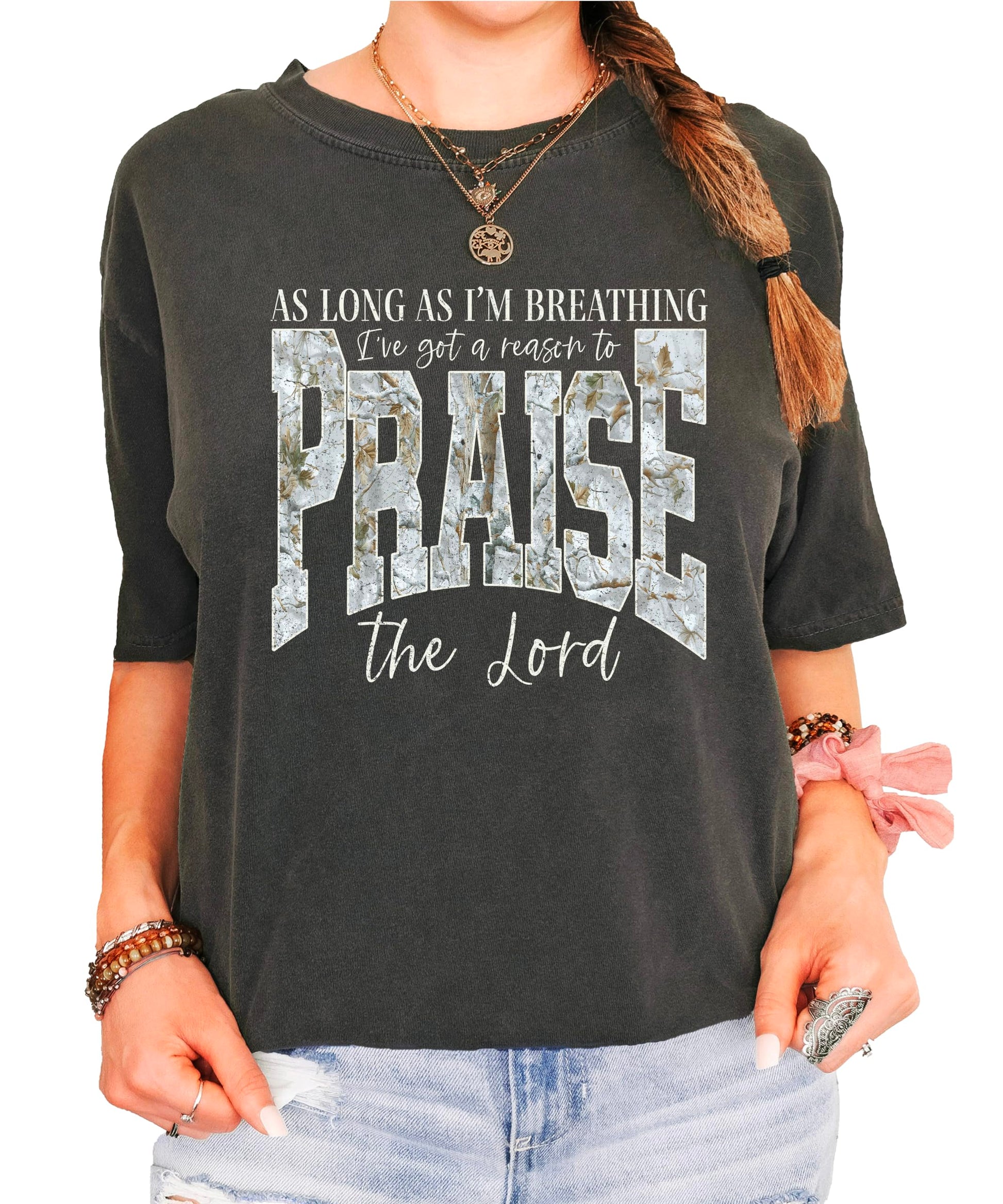 Full front view of women's blue Christian Easter shirt displaying inspirational praise the Lord message