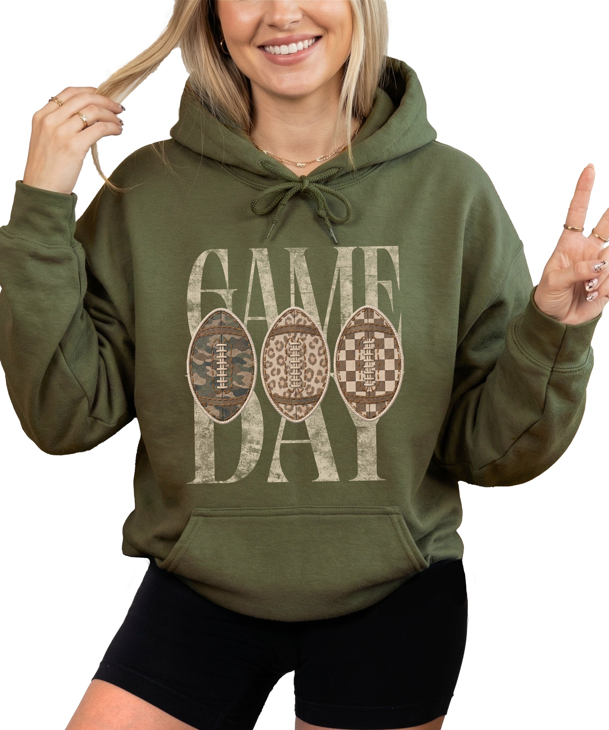 Game Day football hoodie for women in Army Green with camo leopard checkered footballs, front view