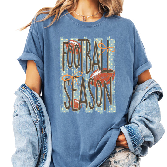 Football Season coquette bow Comfort Colors tee in Blue Jean - front view