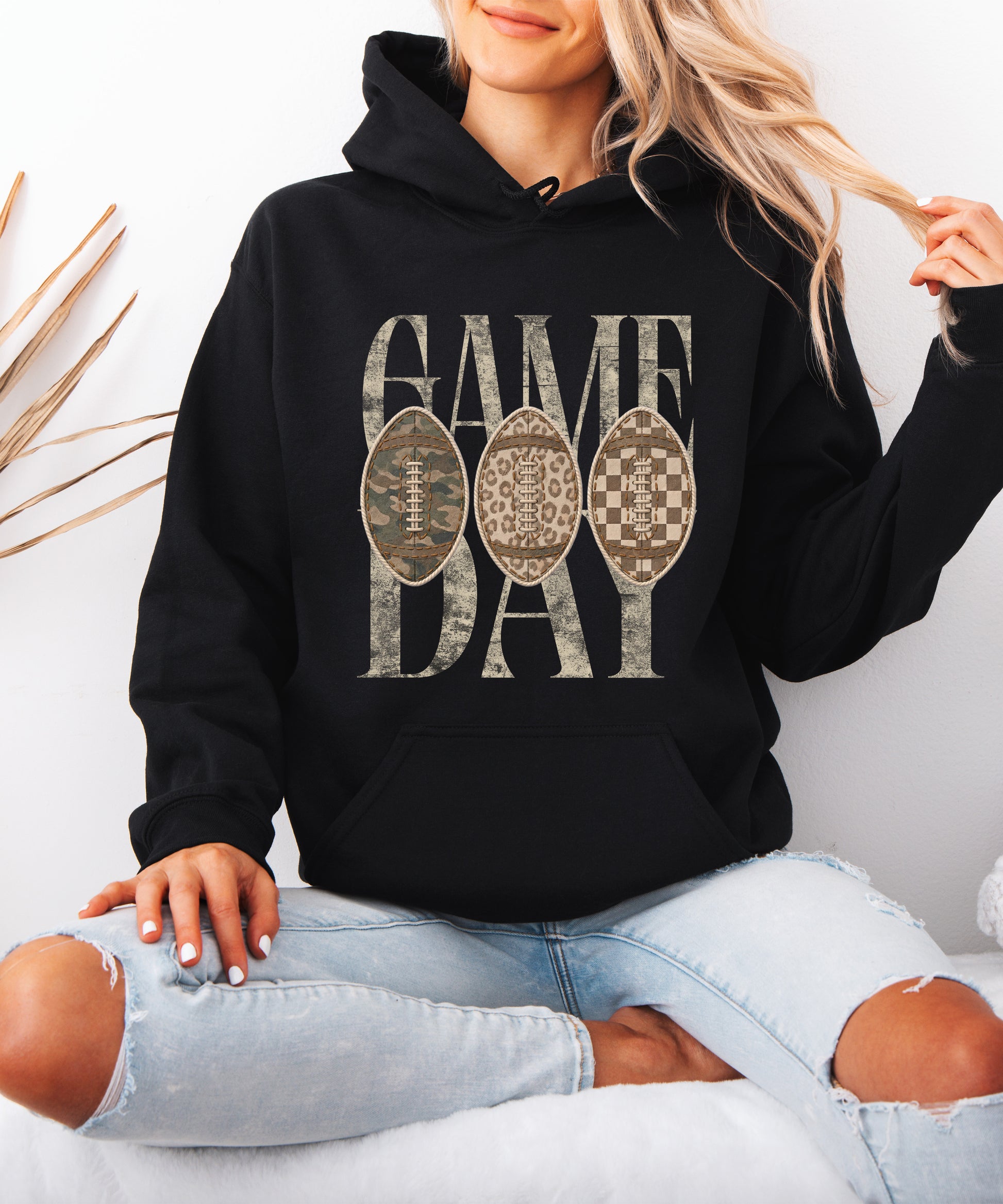 Black Game Day football hoodie, detail view