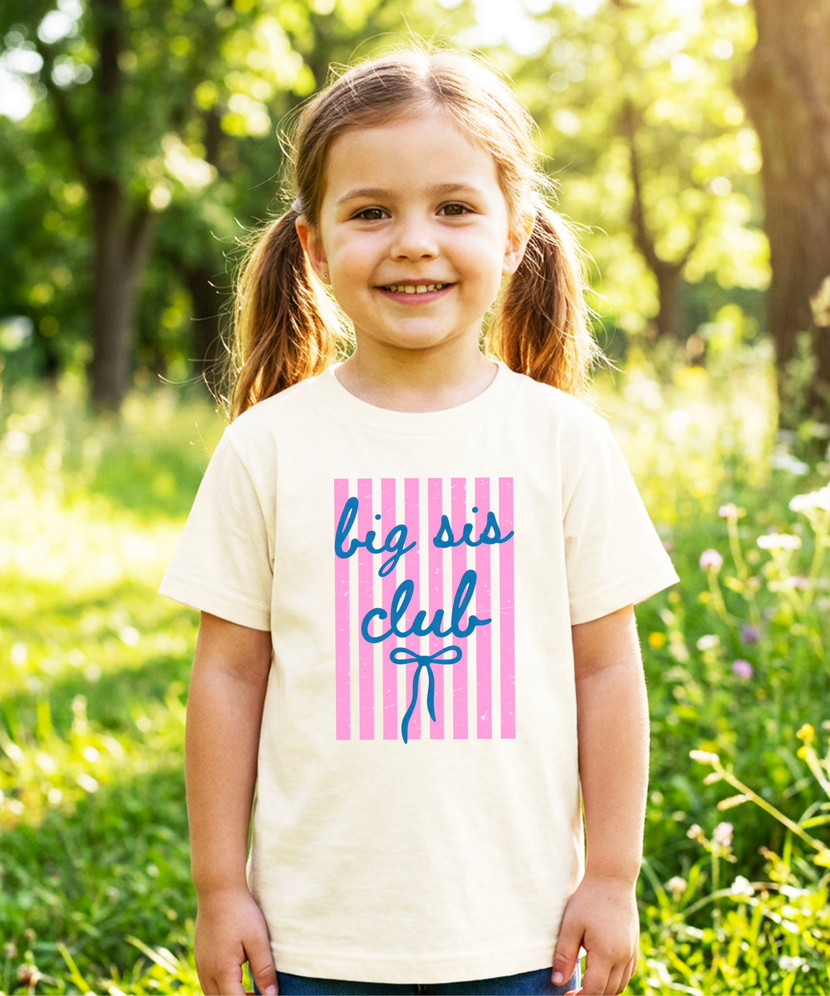 Big Sis Club sibling reveal announcement tee in Natural for girls - styled view