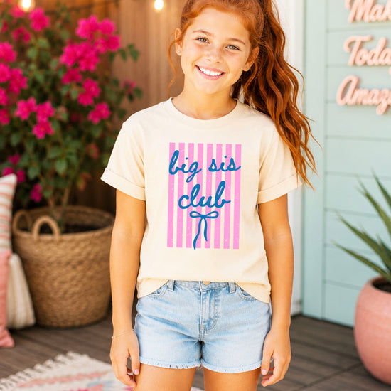 Big Sis Club sibling reveal announcement tee in Natural for girls - lifestyle view