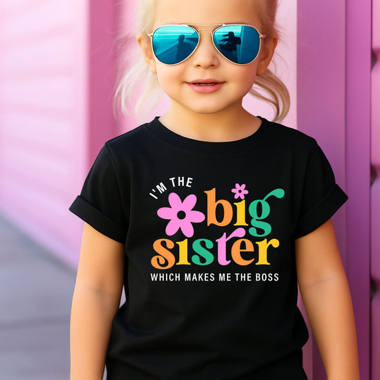 I'm the Big Sister Which Makes Me the Boss girls sibling announcement tee in Black - view 3 by Olive Loves Apple