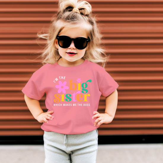 I'm the Big Sister Which Makes Me the Boss girls sibling announcement tee in Mauve - view 2 by Olive Loves Apple