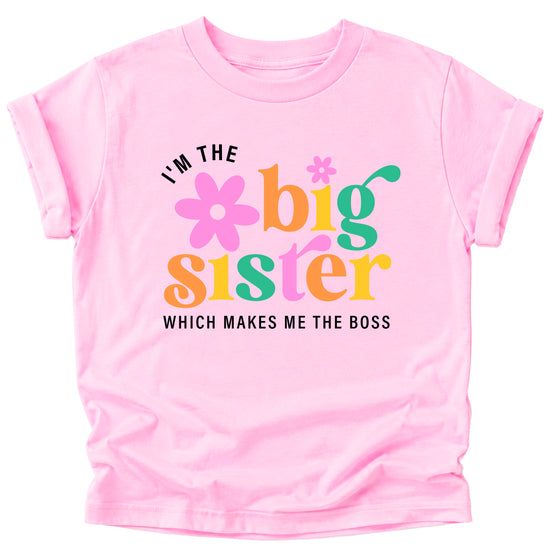 I'm the Big Sister Which Makes Me the Boss girls sibling announcement tee in Pink - view 1 by Olive Loves Apple