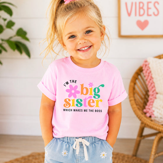 I'm the Big Sister Which Makes Me the Boss girls sibling announcement tee in Pink - view 2 by Olive Loves Apple