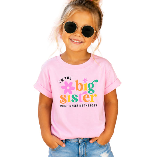 I'm the Big Sister Which Makes Me the Boss girls sibling announcement tee in Pink - view 3 by Olive Loves Apple
