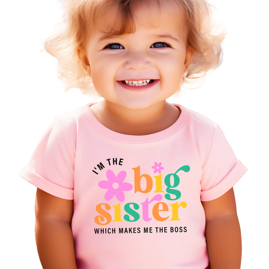 I'm the Big Sister Which Makes Me the Boss girls sibling announcement tee in Pink - view 4 by Olive Loves Apple